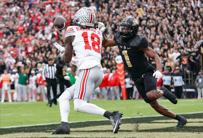 Oct 14, 2023; West Lafayette, Indiana, USA; Ohio State Buckeyes wide receiver Marvin Harrison Jr. (18) catches a pass for a touchdown against Purdue Boilermakers defensive back Markevious Brown (1) during the first half at Ross-Ade Stadium.